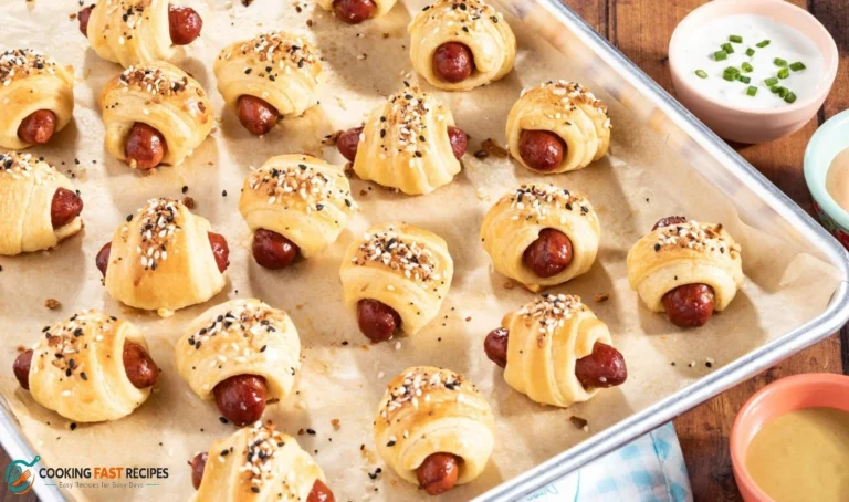 Easy pigs in a blanket made with mini sausages and golden crescent roll dough