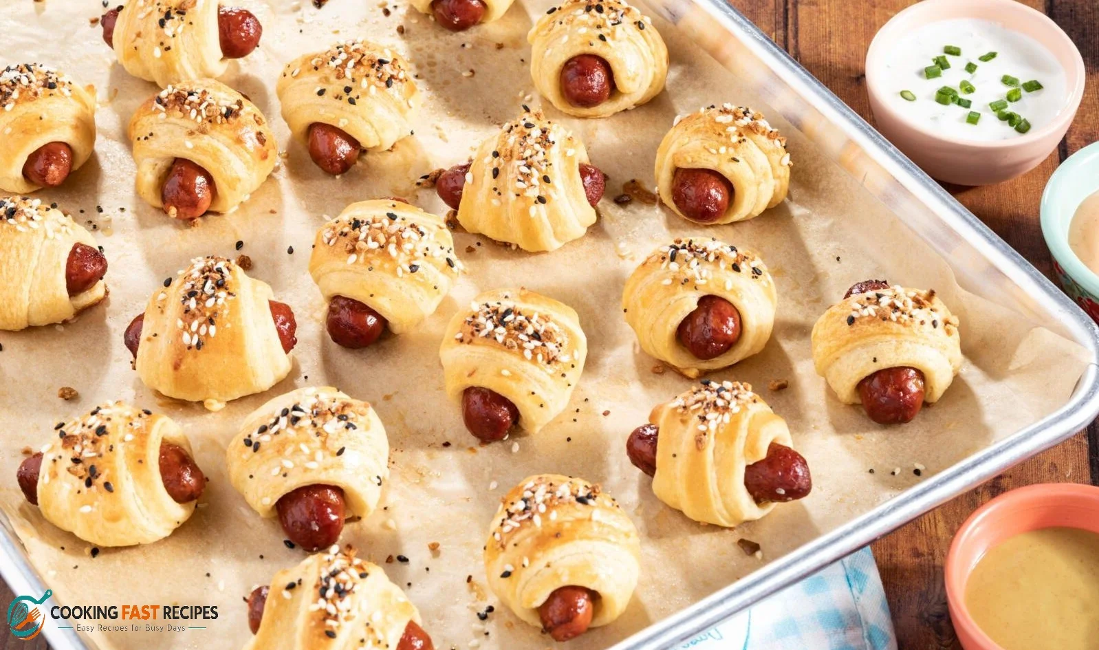 Easy pigs in a blanket made with mini sausages and golden crescent roll dough