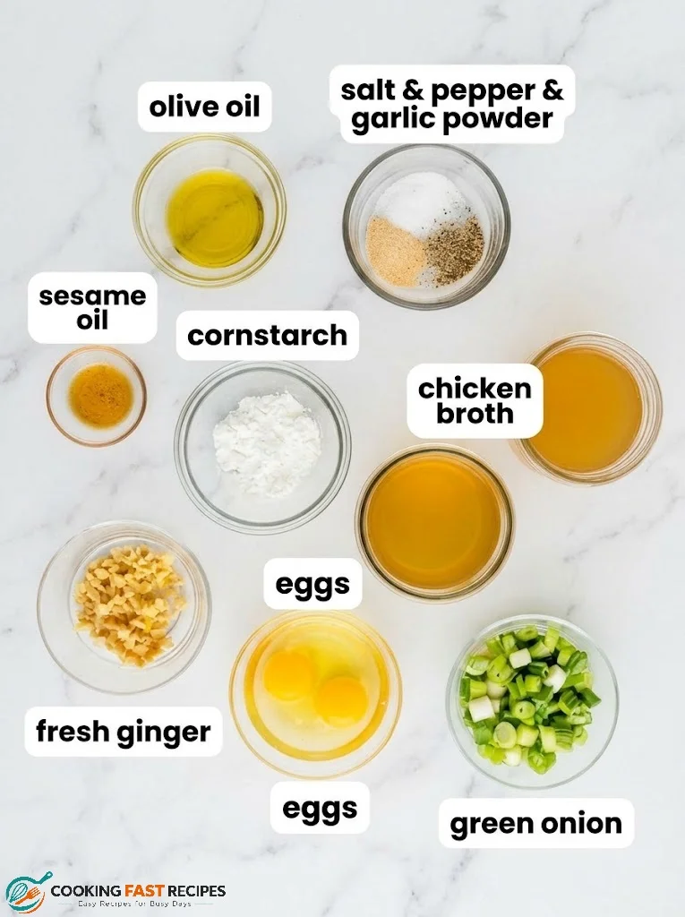 Ingredients for egg drop soup with chicken broth, eggs, cornstarch, and green onions